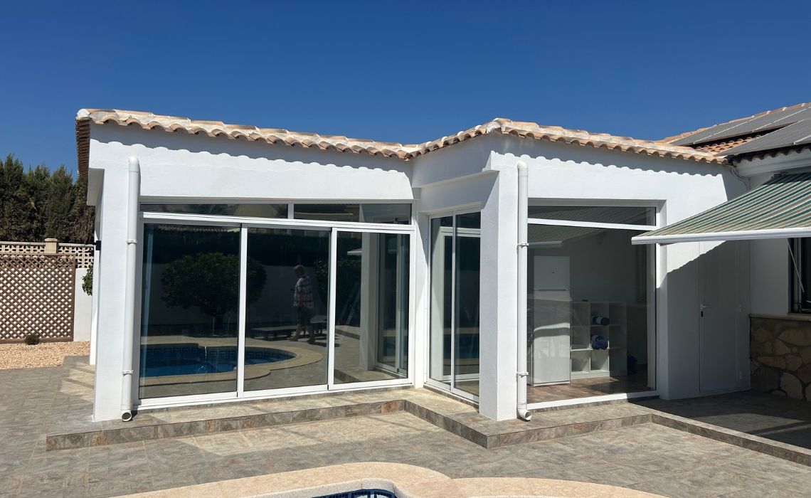 Solar control window film for heat reduction in a Spanish home