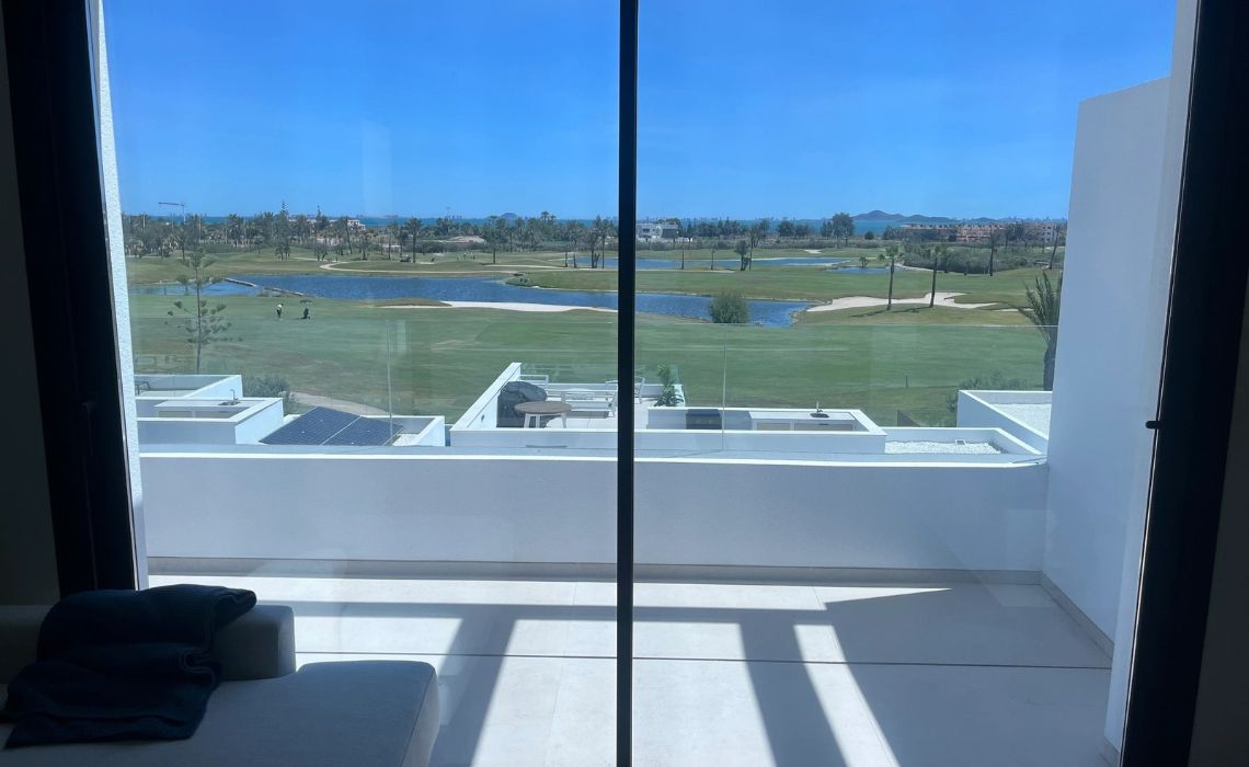 Window film helping reduce sunlight glare in a bright living room